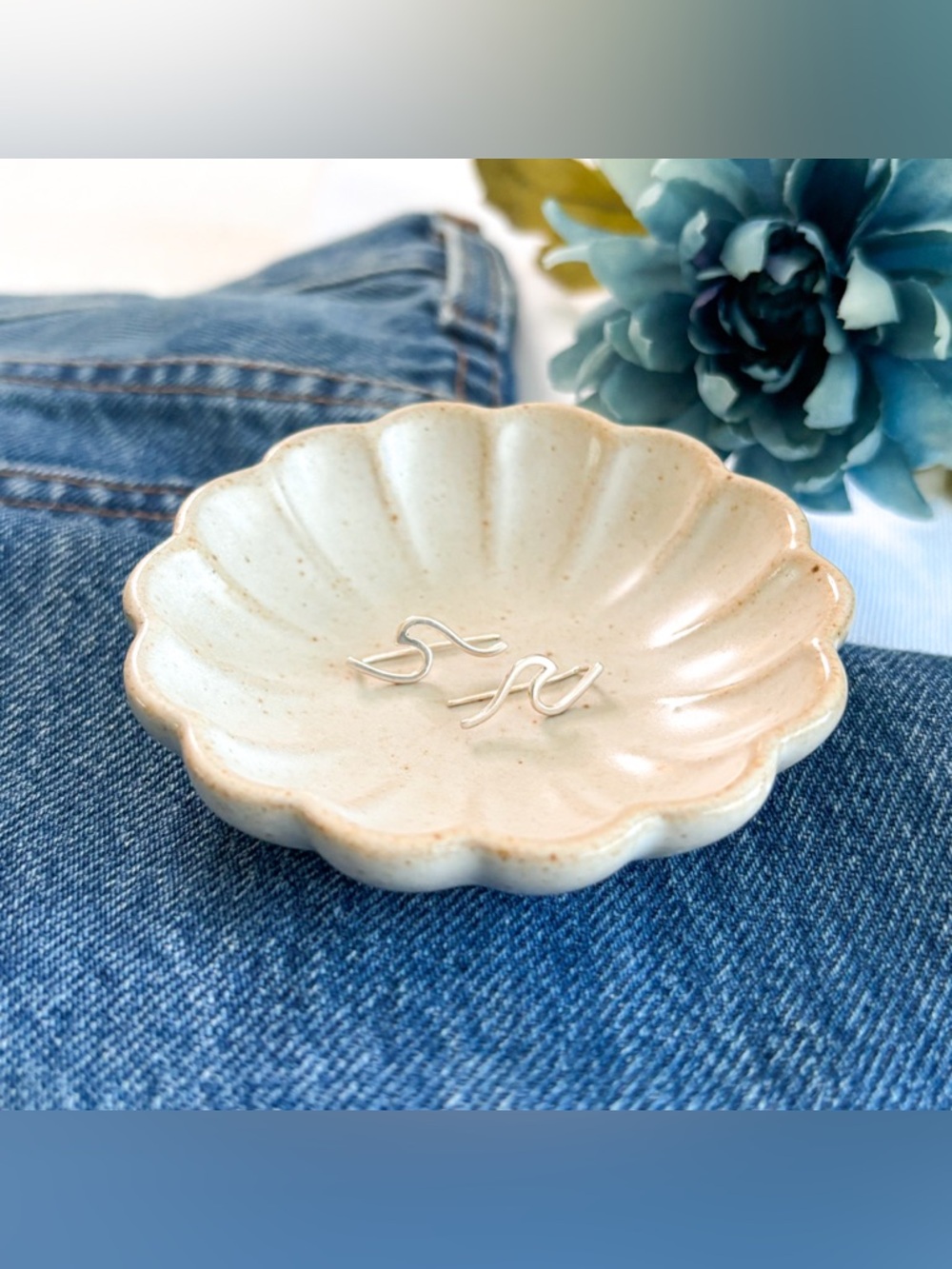 Pura Vida wave earrings.
